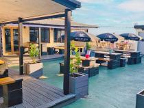 Legends outside terrace over looking the sea